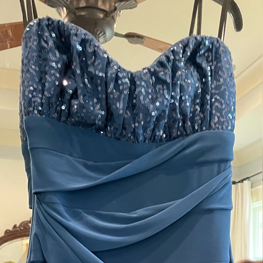 Short formal dress with sequin bodice.